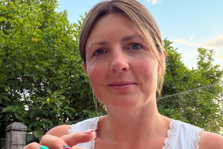 Abigail holding Eternal Skincare Super Hydrating Moisturiser for her My Skin Story